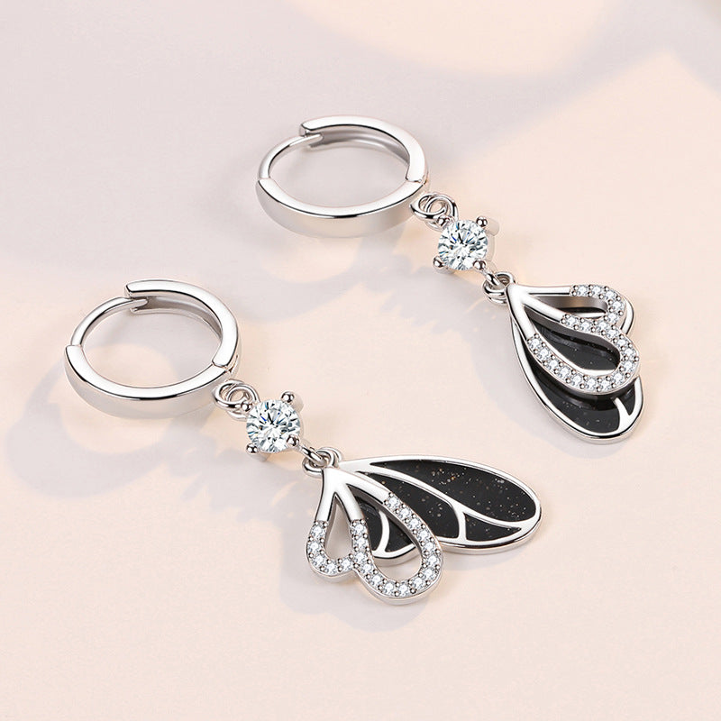 Stylish Diamond-encrusted Butterfly Earrings With A Niche Designer-inspired Look