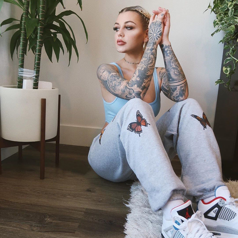 Printed high-waisted slim-fit fleece sweatpants