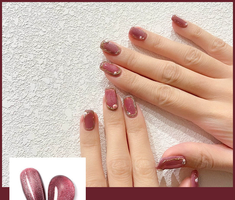 طلاء أظافر على شكل عين قطة مرصعة بحجر كريستالي بنكهة شاي الحليب