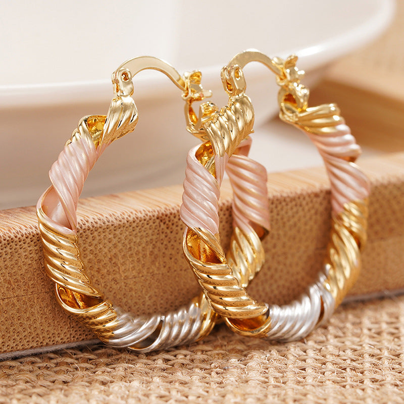 Korean-style Gentle Spiral Hollow Three-color Earrings For Women