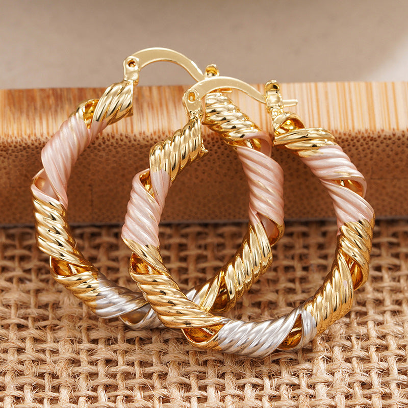 Korean-style Gentle Spiral Hollow Three-color Earrings For Women