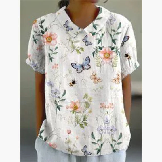 بلوزة نسائية فضفاضة مطبوعة برقبة دائرية