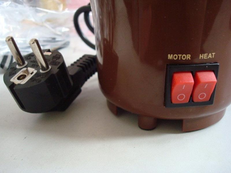 نافورة شوكولاتة صغيرة جديدة بتصميم إبداعي، تذوب الشوكولاتة مع آلة فوندو ساخنة 