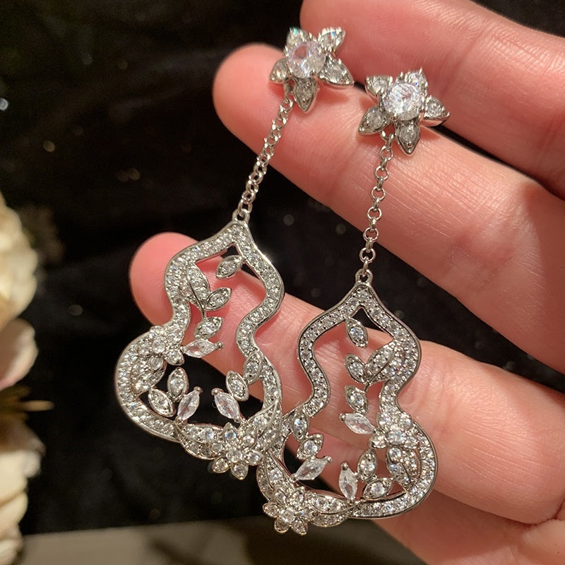 Silver Needle Diamond Studded Bow Earrings