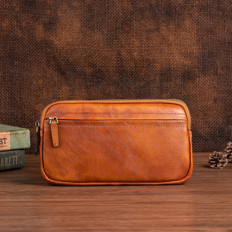 حقيبة يد رجالية كاجوال من جلد البقر، بتصميم عمودي مربع الشكل، مصنوعة من الطبقة الأولى.